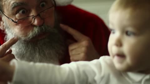 Reaction of baby with santa.