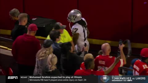 Davante Adams shoves a sideline worker over (uncalled for)