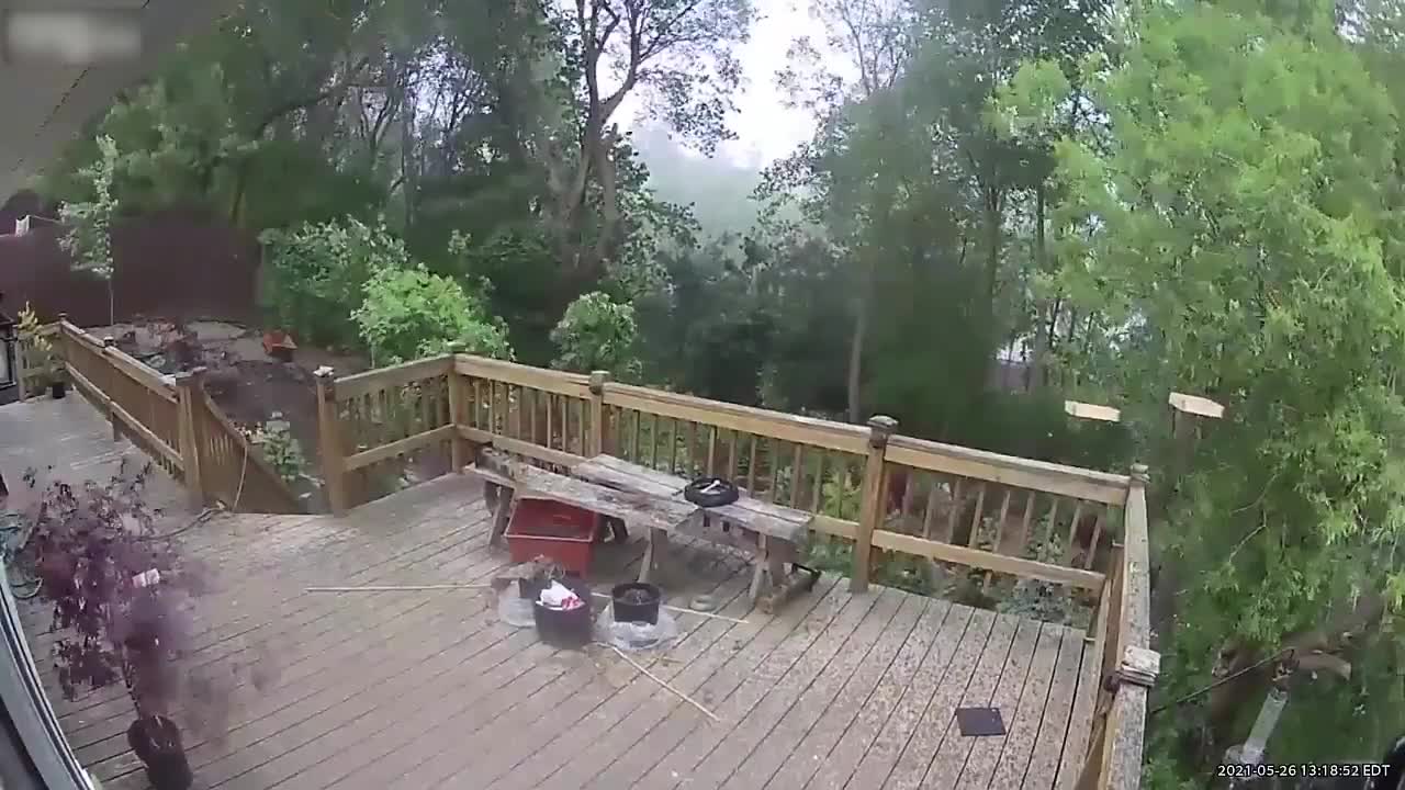 Strong Winds Blow During Thunderstorm in New York and Knock Down Objects on the Balcony