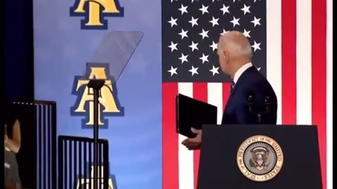 Confused Biden shaking hands with a Ghost