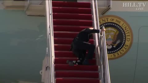 President Joe Biden trips climbing the stairs to Air Force 1..Again 😂😂😂