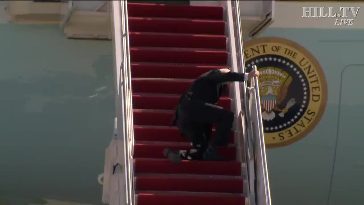 President Joe Biden trips climbing the stairs to Air Force 1..Again 😂😂😂