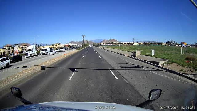 Car Crashes Into Turning Semi