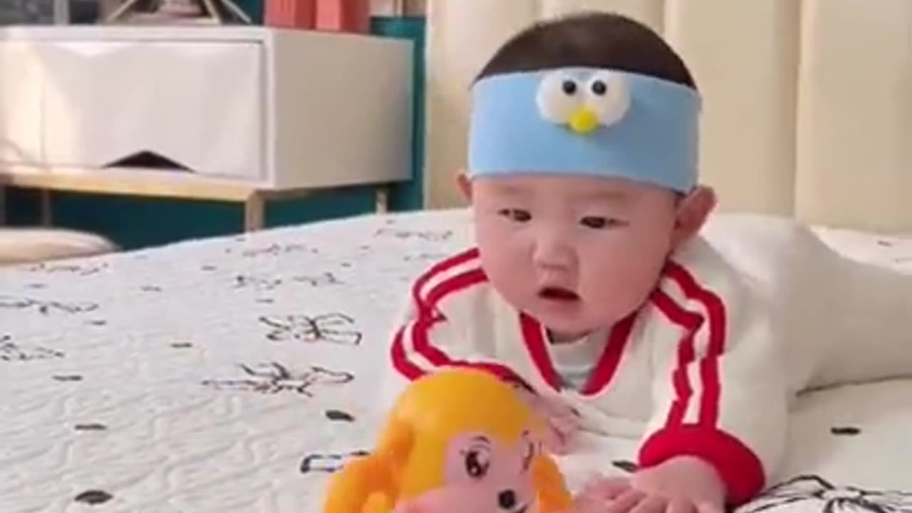 Cute baby playing with toys