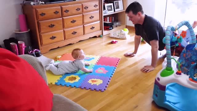 Baby Exercising with Daddy