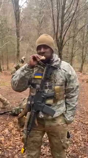 A Black British volunteer Trys Salo(Cured Pigfat)