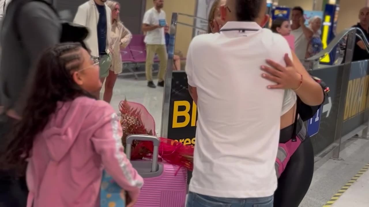 Family Reunited at Airport