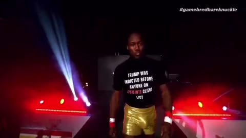 MMA fighter Joel "King Bau" Bauman just walked into the arena wearing a shirt ...