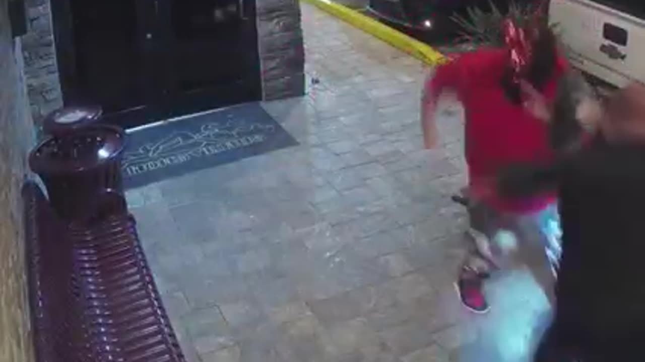 Security guards stopped an armed man with a devil mask