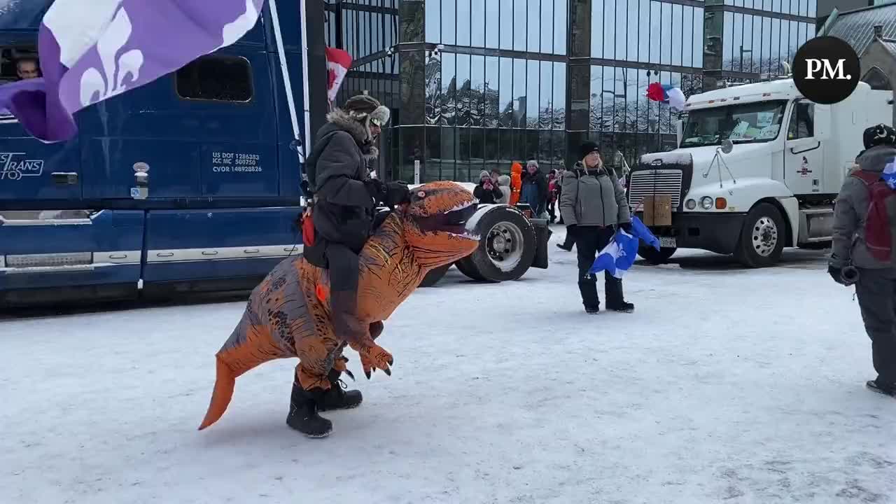 Dinosaur busts a move at the Ottawa Insurrection