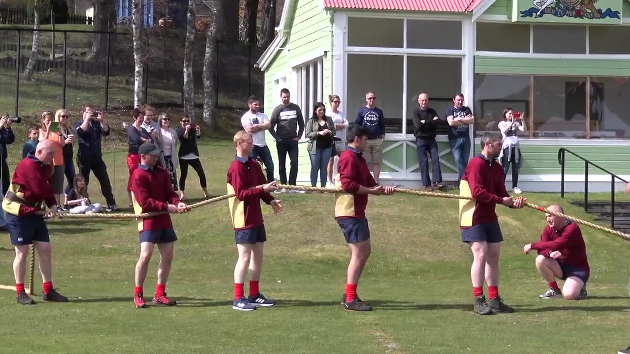 World's Strongest Men in a Tug o' War Challenge at Braemar Gathering Highland Games site in Scotland