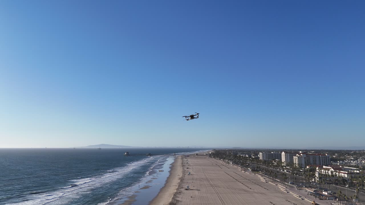 DJI drones meet mid air over Huntington Beach, California