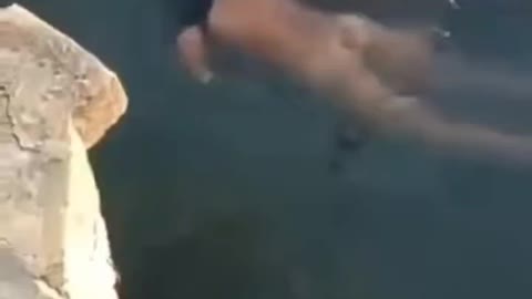 Haunting video of a crocodile with a person in its mouth