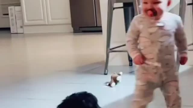 Baby girl is playing with her dog friend ...🐕🐕😘😘😘