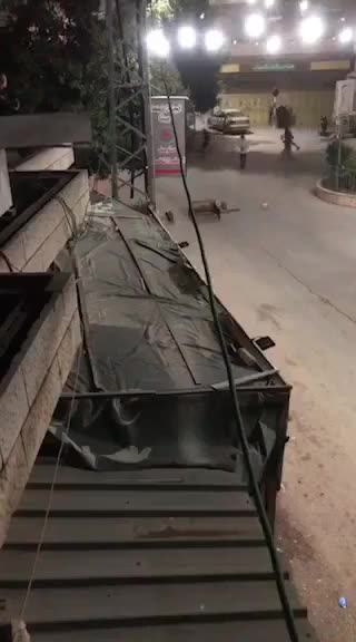 Several Palestinians threw stones at an Israeli military vehicle in Beita