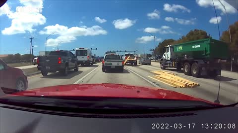 Truck Carrying Wood Package Then Part of It Fell When 3 Planks Decided to Defy Physics