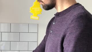 Dad Wears Car Freshener While Changing Baby