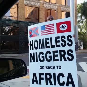 Black American Has Special Message For Racist Man Carrying Hateful Corner Sign