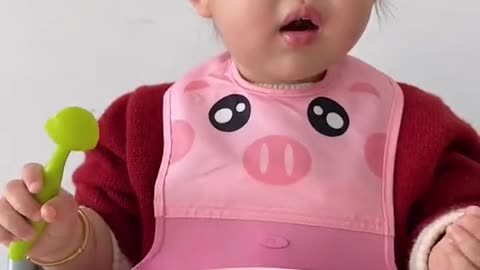 Cute baby eating scene