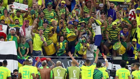 Brazil, Portugal fans celebrate as they advance to World Cup round of 16