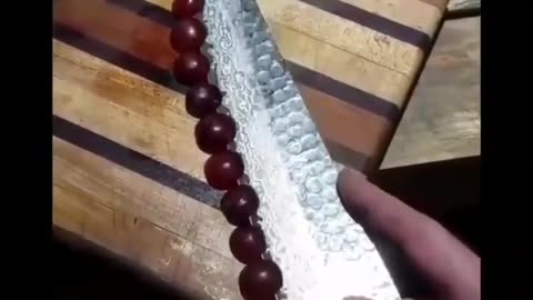 This Sharp Knife Cutting Grapes