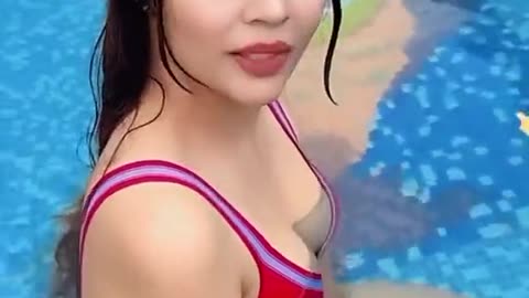 Beautiful Girl in swimming pool