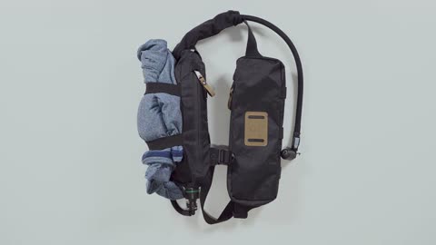 Rear Bottle Bag Instructions for the Qore Performance® EDC Travel Sling