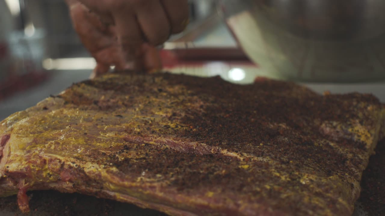 Chef Season Ribs for Barbecuing