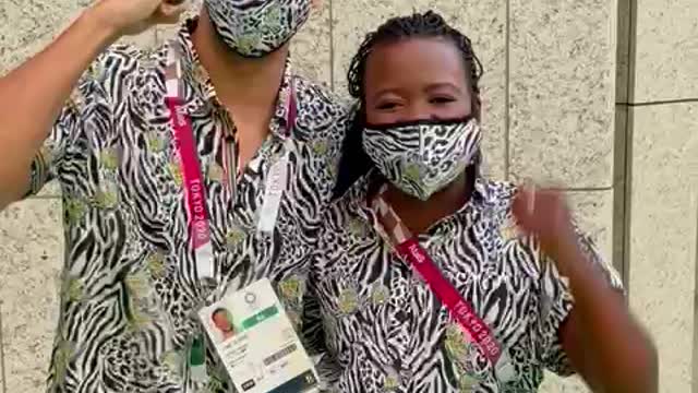 Phumelela Mbande and Chad le Clos Team SA Flag Bearers