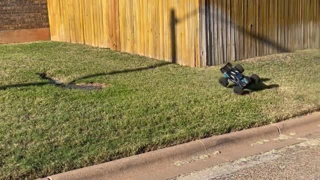 RC Car Absolutely Sends it Up Big Ramp Jumping Over Flag