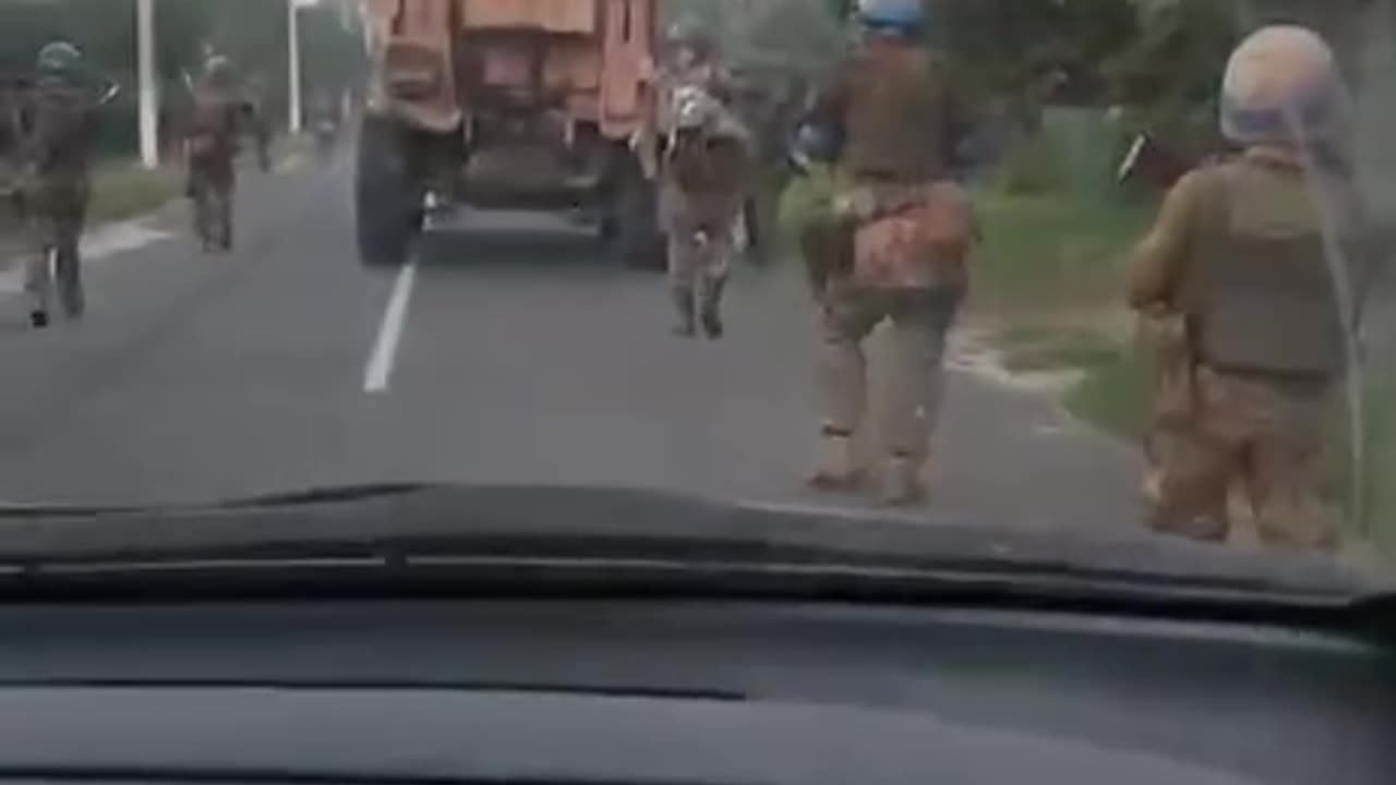 Ukrainian soldiers are passing through civilian populated area in Kursk, Russia