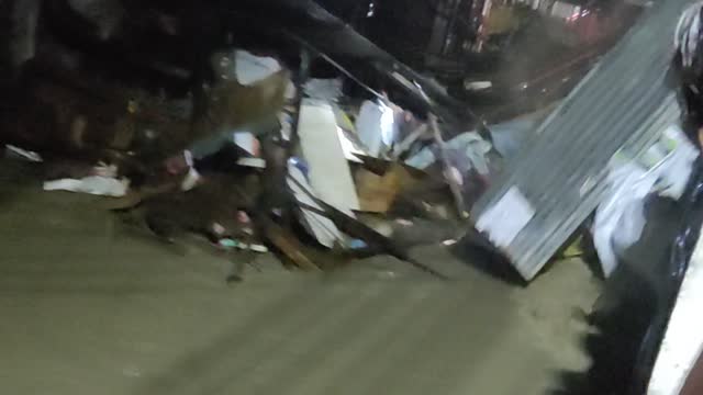 Man and House Get Washed Under Bridge During a Flood