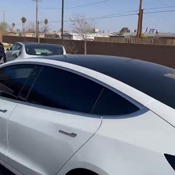 Twelve Teslas Queued Up For A Charge