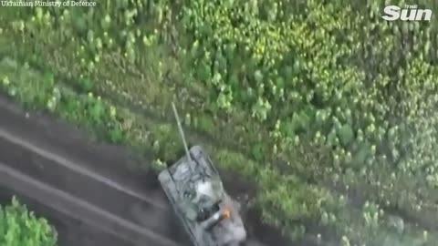 Ukrainian forces blow up Russian tank sending soldier feeling for his life