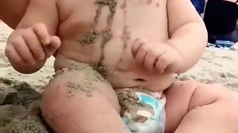 Funny Baby Reaction in the Beach