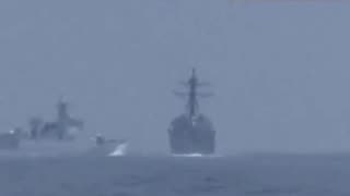 This is the moment a Chinese warship nearly hit an US destroyer in the Taiwan strait.