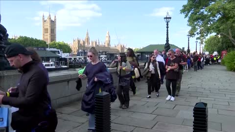 Thousands pass Queen's coffin as she lies in state