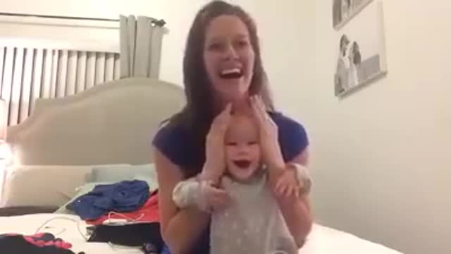 Very funny lauging baby with mom cute baby