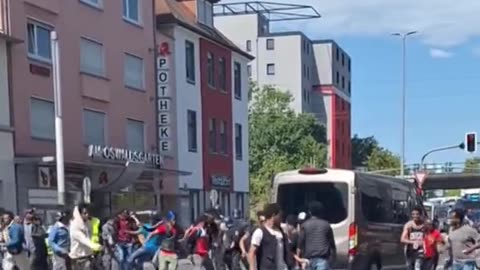 Muslim and African migrants armed with stick and stones are causing havoc in Germany