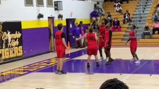 Teammates help their special captain score the winning basket. Very Touching!