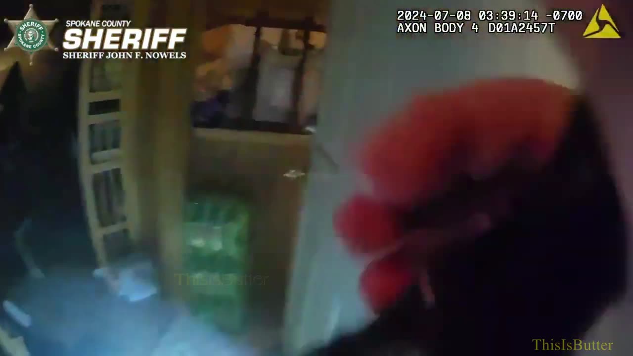 Bodycam video shows sheriff's deputies help two people out of the home as the flames grow