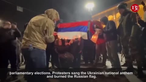 Protesters in Georgia burn Russian flag