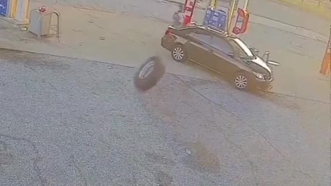 The car parked outside the gas station was repaired by unexpected trouble.