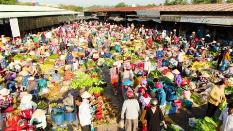 People Buying Vegetables at Market