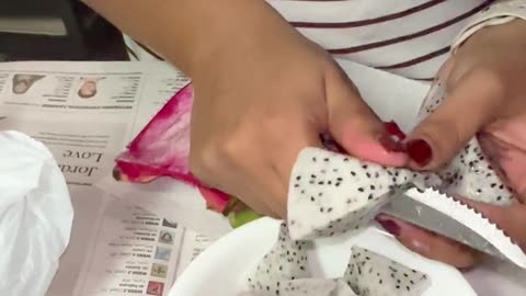 Cutting the Dragon fruit