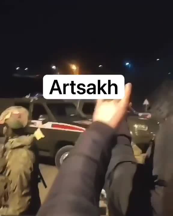 Azerbaijan: Protesters make far right/neo Nazi Grey Wolves gesture in front of Russian peacekeepers