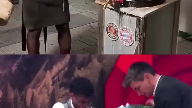 Kingsley Coman taps the beer barrel