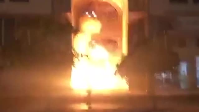 Protesters Set Fire to Government Buildings
