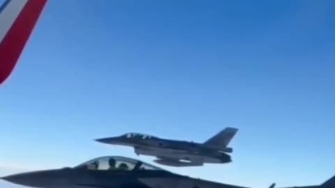 Escorted by two fighters jets