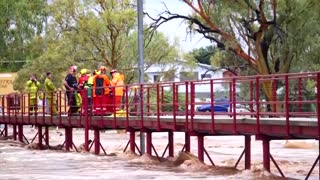 Man clings to tree in Australia after record rainfall